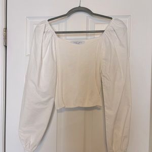 White sweater with puffy sleeves